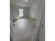 Bright bedroom with a window and tile floors at 1780 Converse Ct, Deltona, FL 32738