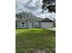 Charming single-story home with a well-manicured lawn and attached two-car garage at 1780 Converse Ct, Deltona, FL 32738