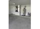Well-lit garage space featuring an HVAC system and water heater for home utilities at 1780 Converse Ct, Deltona, FL 32738