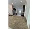 Kitchen with island sink, stainless appliances and dark cabinetry at 1780 Converse Ct, Deltona, FL 32738
