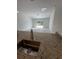 Open floor plan with kitchen, granite counters, and stainless sink at 1780 Converse Ct, Deltona, FL 32738