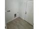 Bright laundry room featuring tile floors and a utility sink hook-up at 1780 Converse Ct, Deltona, FL 32738