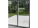 Close-up of glass patio doors with a backyard view at 1780 Converse Ct, Deltona, FL 32738