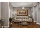 Sophisticated living room with neutral tones, elegant decor, and ample natural light at 8300 Ludington Cir, Orlando, FL 32836