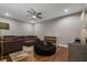 Comfortable living room with a large sectional sofa, beanbag chair, and entertainment setup for relaxation at 8300 Ludington Cir, Orlando, FL 32836