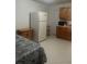 Efficient kitchenette with modern appliances and ample counter space, ideal for convenient meal preparation at 435 Caribbean Dr, Davenport, FL 33897