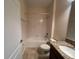 Clean bathroom with tub, shower, and granite vanity at 9002 Majesty Palm Rd, Kissimmee, FL 34747