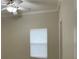 Bedroom featuring a ceiling fan and a window with blinds at 681 Coronado Dr, Kissimmee, FL 34759