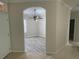 Flex room featuring modern gray laminate flooring and a ceiling fan at 681 Coronado Dr, Kissimmee, FL 34759