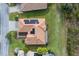 Aerial view of house showing roof and solar panels at 729 San Raphael St, Kissimmee, FL 34759