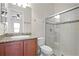 Bathroom boasts granite vanity and a walk-in shower at 729 San Raphael St, Kissimmee, FL 34759