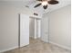 Bedroom with double doors leading to other rooms at 729 San Raphael St, Kissimmee, FL 34759