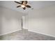 Bright and airy bedroom with tile flooring and ceiling fan at 729 San Raphael St, Kissimmee, FL 34759