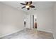Spacious bedroom with tile floors and ceiling fan at 729 San Raphael St, Kissimmee, FL 34759