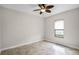 Bright bedroom with tile flooring and ceiling fan at 729 San Raphael St, Kissimmee, FL 34759
