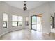 Bright breakfast room featuring tile floors and sliding glass doors leading to the outdoors at 729 San Raphael St, Kissimmee, FL 34759