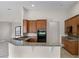 Modern kitchen with stainless steel appliances and granite countertops at 729 San Raphael St, Kissimmee, FL 34759