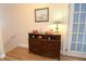 Entryway with wooden dresser, providing storage and decorative appeal at 612 Maple Oak Cir # 108, Altamonte Springs, FL 32701