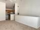 Open-concept living space with partial view of the kitchen and breakfast bar at 3432 Westchester Square Blvd # 205, Orlando, FL 32835