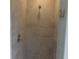 Modern shower with tiled walls and glass door at 531 Rhodes Dr, Deland, FL 32720