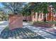 Beautiful brick building and sign for Stetson University with colorful landscaped flowerbeds at 531 Rhodes Dr, Deland, FL 32720