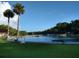 Beautiful outdoor swimming pool with seating and palm trees at 531 Rhodes Dr, Deland, FL 32720