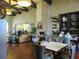 Elegant clubhouse interior with high ceilings, stylish furniture, and a cozy fireplace area at 333 Navarra Ln, Davenport, FL 33837
