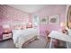 Pink bedroom with whimsical decor and a comfortable bed at 2288 Sirena Ln, Mount Dora, FL 32757