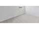 Bright bedroom with soft carpet, white walls, and natural light from window at 2288 Sirena Ln, Mount Dora, FL 32757