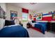 Themed bedroom with two beds and comic book decor at 2288 Sirena Ln, Mount Dora, FL 32757