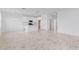 Open floor plan with a kitchen island and tile flooring throughout the living space at 2288 Sirena Ln, Mount Dora, FL 32757