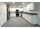 A stylish kitchen features granite countertops, stainless steel appliances, and ample cabinet space for modern living at 4808 Anderson Rd, Orlando, FL 32812