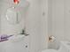 Well lit, stylish bathroom with decorative mirror, and toilet with patterned seat at 9 Stone Gate N, Longwood, FL 32779