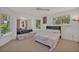Bright bedroom featuring multiple beds, natural light, and a comfortable layout perfect for a Gathering at 9 Stone Gate N, Longwood, FL 32779