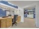 Functional home office area with a built-in desk, and a walk-in closet for plenty of storage at 9 Stone Gate N, Longwood, FL 32779