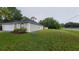 Charming single-story home with a well-manicured lawn and a convenient attached garage at 1312 Swiss Ln, Deltona, FL 32738