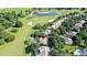Property location highlighted near golf course and lake at 25515 Hawks Run Ln, Sorrento, FL 32776