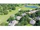 Aerial view of home in a golf course community at 25515 Hawks Run Ln, Sorrento, FL 32776