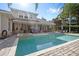 Inviting pool and spa with ample patio space for lounging at 25515 Hawks Run Ln, Sorrento, FL 32776