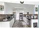 Modern kitchen featuring stainless steel appliances and dark countertops at 206 Orienta Point St # 206, Altamonte Springs, FL 32701