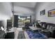 Spacious living room with vaulted ceilings and comfy leather sofas at 206 Orienta Point St # 206, Altamonte Springs, FL 32701