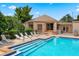 Refreshing community pool with lounge chairs and patio area at 206 Orienta Point St # 206, Altamonte Springs, FL 32701