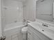 Clean bathroom with a white vanity, tub, and shower at 423 Mondra Ct, Lakeland, FL 33809