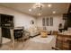 Finished basement with games, sectional seating, and stylish decor at 4600 Nebraska Ave, Sanford, FL 32771