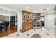 Gourmet kitchen with stainless steel appliances, granite countertops, and custom cabinetry for a luxurious cooking experience at 4600 Nebraska Ave, Sanford, FL 32771