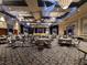 Spacious ballroom with elegant blue draping and a stage, ideal for large events and gatherings at 840 Jasmine Creek Rd, Kissimmee, FL 34759
