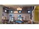 Community bar with multiple TVs and a lively atmosphere at 840 Jasmine Creek Rd, Kissimmee, FL 34759