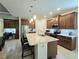 Beautiful kitchen with granite countertops, stainless steel appliances, and a spacious island at 840 Jasmine Creek Rd, Kissimmee, FL 34759