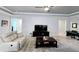 Comfortable living room featuring contemporary decor, neutral color palette and recessed lighting at 840 Jasmine Creek Rd, Kissimmee, FL 34759