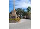 Welcoming entrance to Solivita, featuring a decorative monument and lush landscaping at 840 Jasmine Creek Rd, Kissimmee, FL 34759